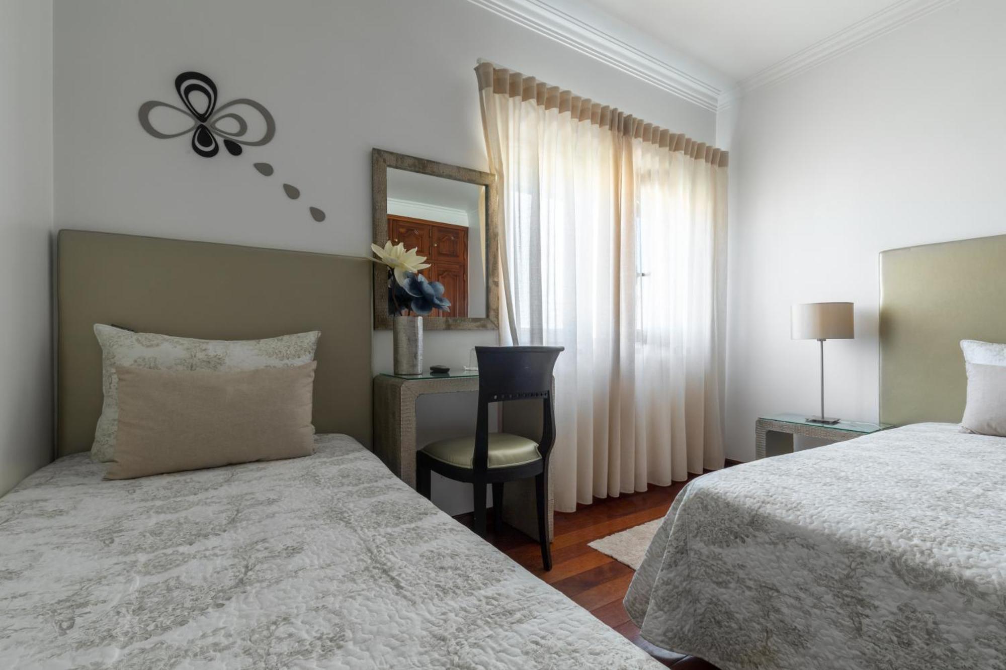 Quarto Triplo Deluxe
